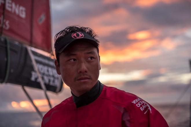 Dongfeng Race Team - Jin Hao Chen 'Horace' watches Azzam fly by - Volvo Ocean Race 2014-15 © Sam Greenfield/Dongfeng Race Team/Volvo Ocean Race